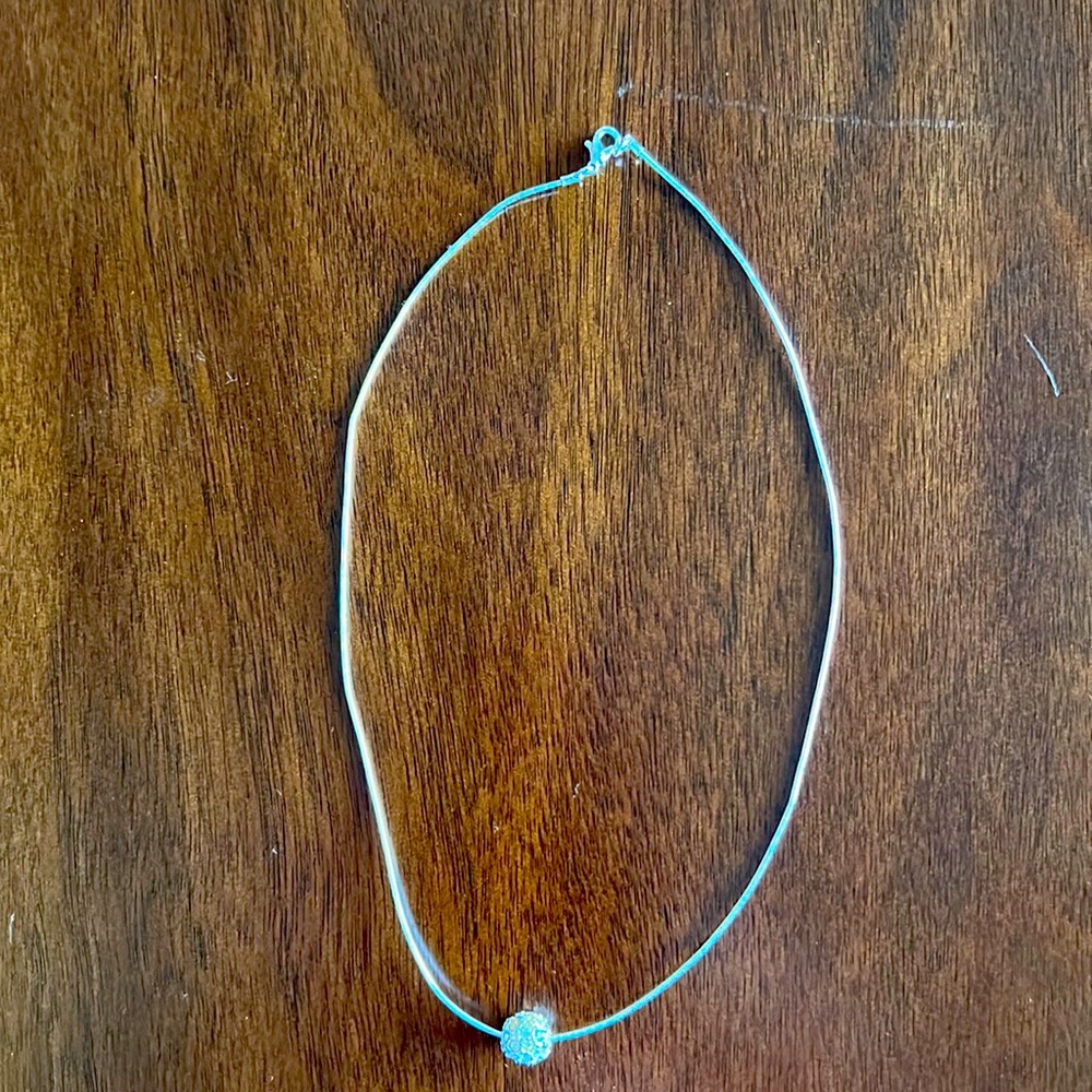 Silver necklace with ball charm